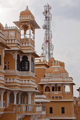 Contrast of old and new in Rajasthan where a mobile phone mast stands adjacent to the 17th century Deogarh Mahal