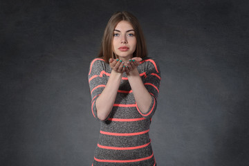 Kindness, thrift concept. Female clasped her hands together