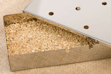 Smoker Box - Wood chips inside a metal smoking box. BBQ Time!
