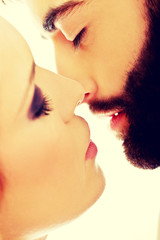 Obraz premium Happy beautiful couple kissing.