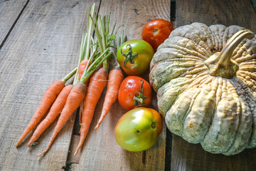 organic vegetables on wooden background