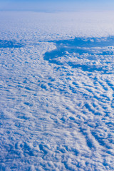 White clouds.  Beautiful blue sky sea,  a view from an aeroplane