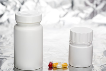 Medical capsules with white plastic bottle