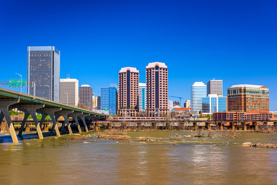 Richmond, Virginia, USA downtown skyline on the James River.