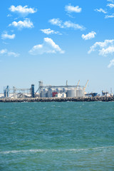 Fototapeta premium Grain or cereal silo in a harbor area
