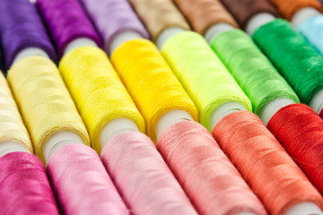 Bobbins with multicolored thread for sewing