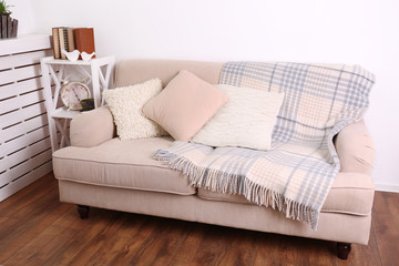 Fototapeta na wymiar Modern room with comfortable sofa, indoors