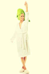 Happy woman posing in bathrobe