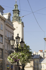 Fototapeta na wymiar Vintage lantern on square in Lviv