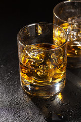 Glasses of scotch whiskey with ice
