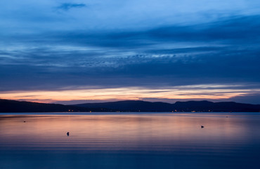 Fototapeta na wymiar amazing evening sky sunset on lake
