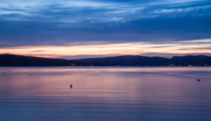Fototapeta na wymiar amazing evening sky sunset on lake