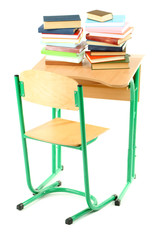 Wooden desk with books and chair isolated on white