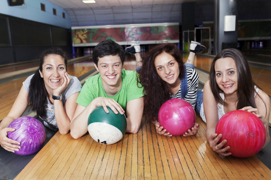 group of friends getting ready to play bowling