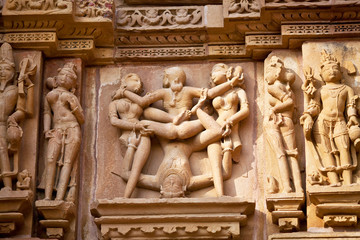 Bas-relief at famous erotic temple in Khajuraho, India