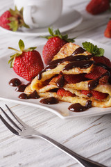crepes with fresh strawberries and chocolate, vertical
