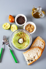 fresh green avocado cream and homemade bread pagnotta