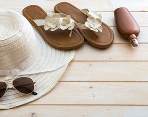 beach accessories on a  wooden background