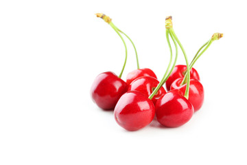Ripe cherries isolated on white