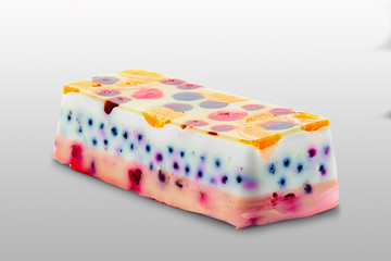 Piece of a colorful jelly cake