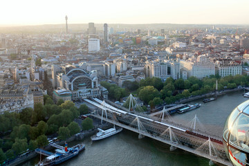 Beautiful view on London's north-western part from London Eye tourist attraction wheel: cityscape, BT Tower, Charing Cross Station, Centre Point and bridge over Thames river