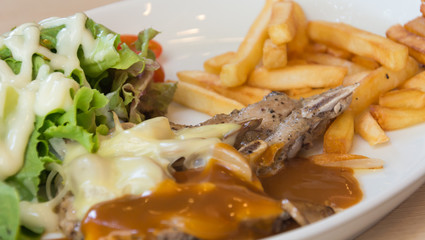 pork chop steak with cheese and black pepper mushroom gravy