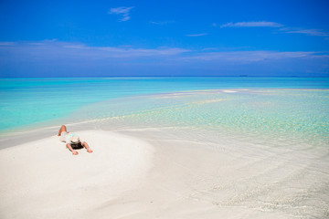 Young woman enjoy tropical beach vacation