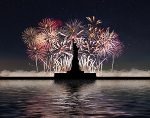 Statue of Liberty on the background of fireworks and starry sky