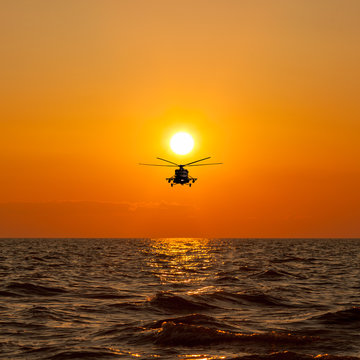 Mi-8 helicopters, warm sunset