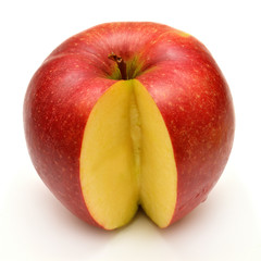 Ripe red apple closeup cut a slice