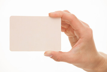 Female hand holding a  paper card