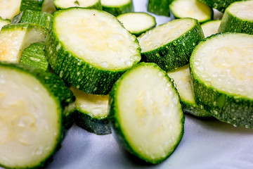 sliced zucchini prepared for grilling on a picnic