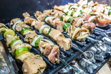 shish kebab on skewers on a grill on a holiday