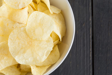 potato chips on wood background