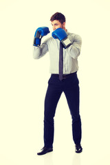 Businessman with boxing gloves.