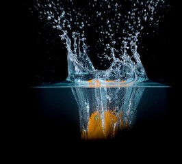 Fruit Splashing into water.