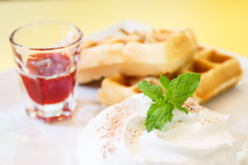 Strawberry Waffle whipped Cream on yellow desk
