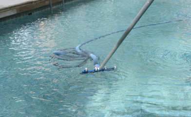 Cleaning the swimming pool