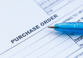 Fototapeta premium purchase order with blue pen in the office‏
