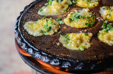 scallop with garlic in hot plate