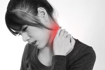 Young  woman with a pain in the neck