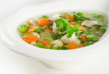Healthy Chicken soup with vegetables in a bowl.