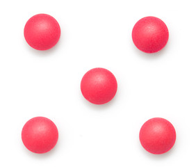 red pills on white background