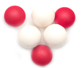 colored pills on white background