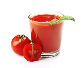 Glass of fresh tomato juice isolated on white