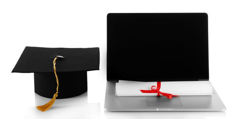 Graduation cap with laptop and diploma isolated on white