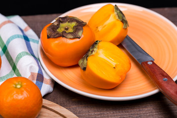 two persimmons