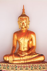 Bangkok, Thailand - April 13, 2015: Buddha statue inside the Wat Pho temple, known also as the Temple of the Reclining Buddha