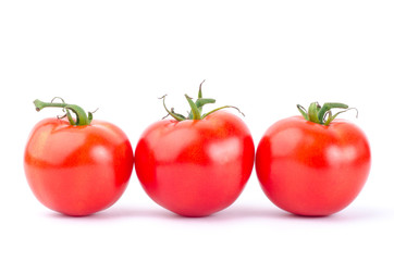 Fresh tomatoes on white background