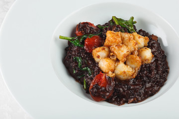 porridge made with wild rice and tomato